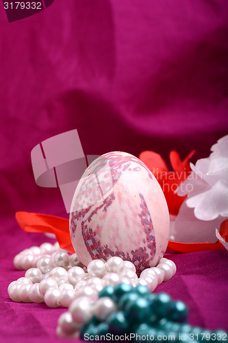 Image of Easter setting with gift box and spring decoration