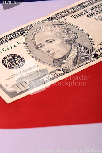 Image of american dollars on american flag