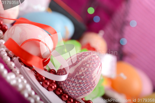 Image of Easter setting with gift box and spring decoration