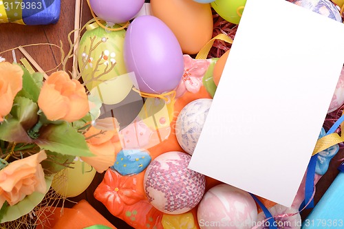 Image of Easter setting with gift box and spring decoration