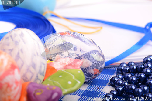 Image of Easter setting with gift box and spring decoration