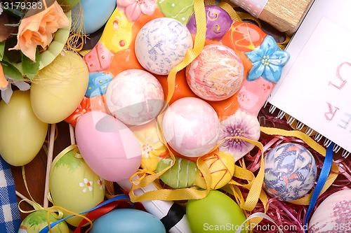 Image of Easter setting with gift box and spring decoration