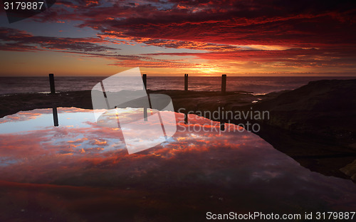 Image of Spectacular sunrise over Ivo Rowe Rockpool Coogee Australia