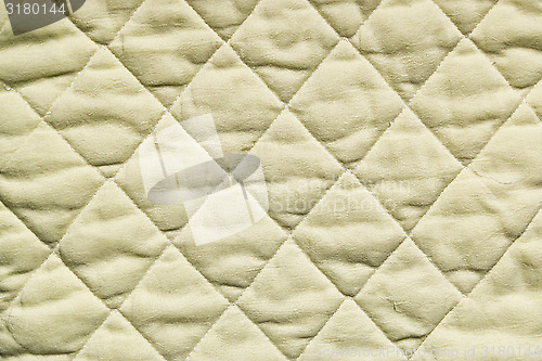 Image of Texture of stitched fabric squares 