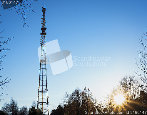 Image of TV tower in blue sky at sunset 