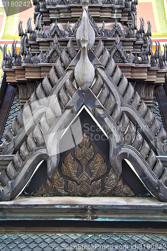 Image of roof  gold    temple   in   bangkok  black