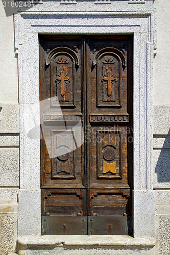 Image of old abstract in venegono italy   the old  wall   church door  