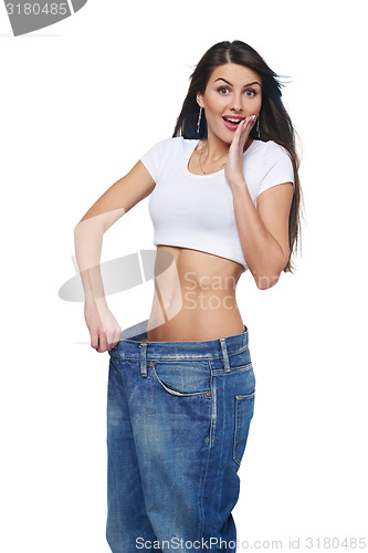 Image of Young woman delighted with her dieting results