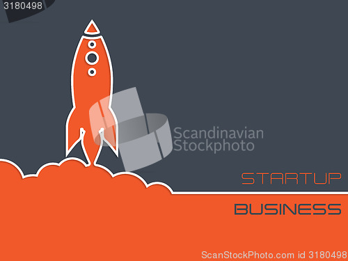 Image of Simplistic startup business background with rocket