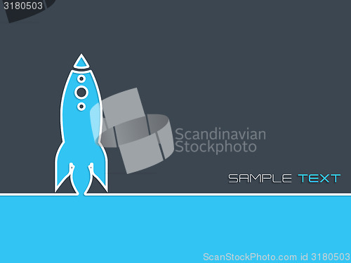 Image of Simplistic startup business background with blue rocket 