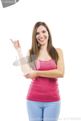 Image of Beautiful woman pointing to something