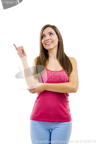 Image of Beautiful woman pointing to something