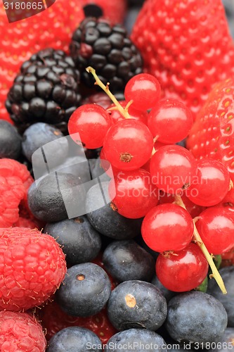 Image of raspberries, blackberries, strawberries summer background