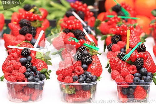 Image of raspberries, blackberries, strawberries summer background