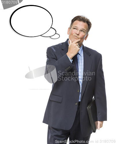 Image of Pensive Businessman Looking Up At Blank Thought Bubble