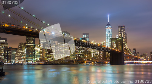 Image of Brooklyn bridge at dusk, New York City.