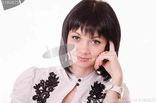 Image of Portrait of a beautiful girl in white blouse