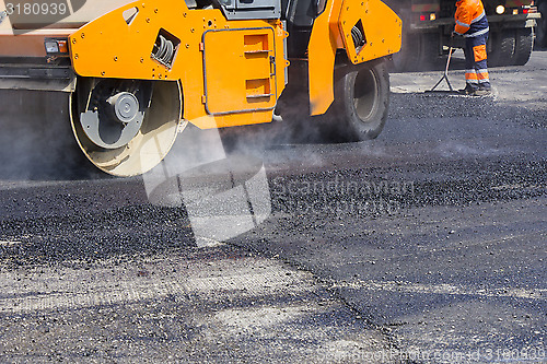 Image of Asphalting city streets