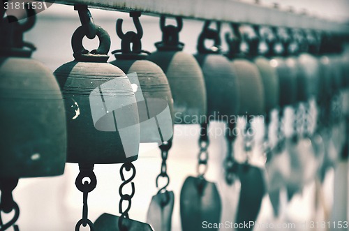 Image of Vintage tone holy bell of ceremony in temple, Thailand