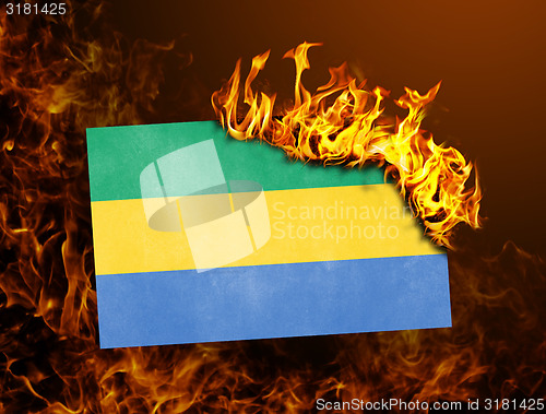 Image of Flag burning - Gabon