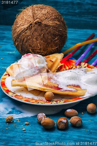 Image of freshly baked waffle pecan coconut dessert 