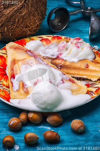 Image of freshly baked waffle pecan coconut dessert 