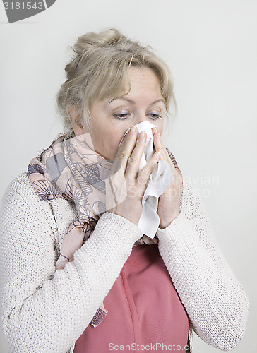 Image of Mature woman with handkerchief