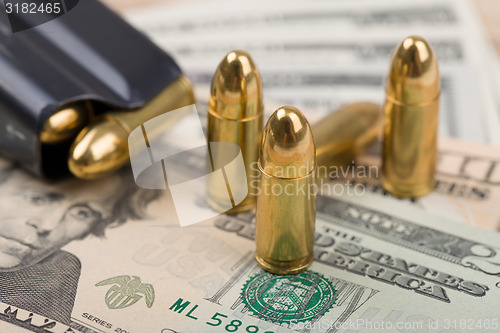 Image of bullet on US dollar banknotes