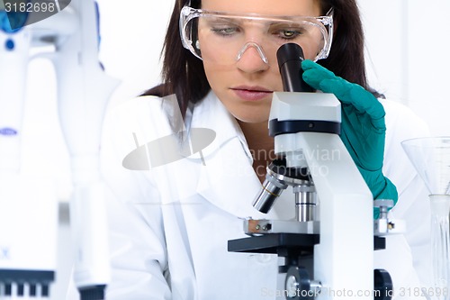 Image of Young chemist in the laboratory.