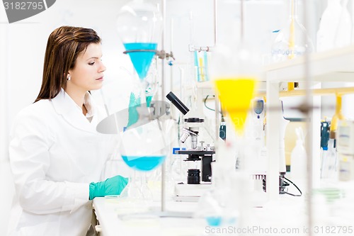 Image of Young chemist in the laboratory.