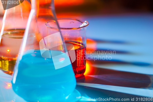 Image of Backlit laboratory flask.