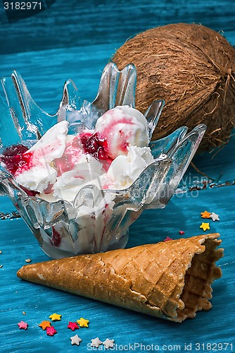 Image of ice cream in  bowl and two waffle cup