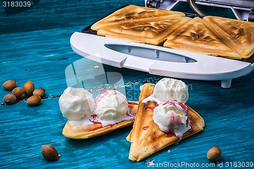 Image of baked toast smeared ice cream in raspberry jam 