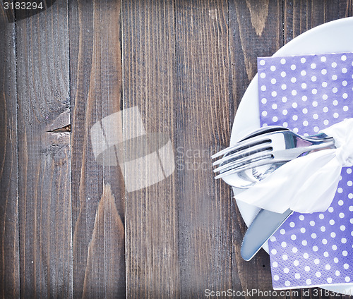 Image of fork, knife and plate