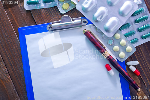 Image of note and pills