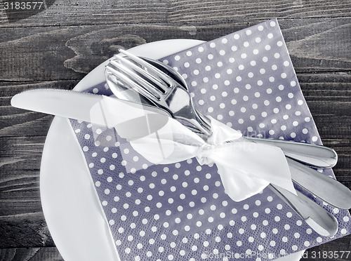 Image of fork, knife and plate