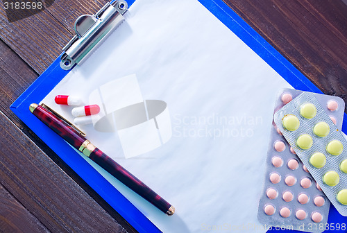 Image of note and pills