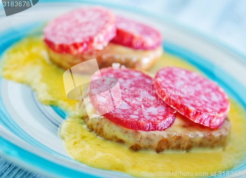 Image of bread with salami and cheese