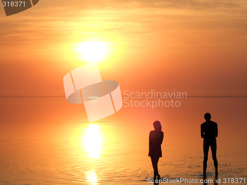 Image of A black silhouette of a children on a sunset 2