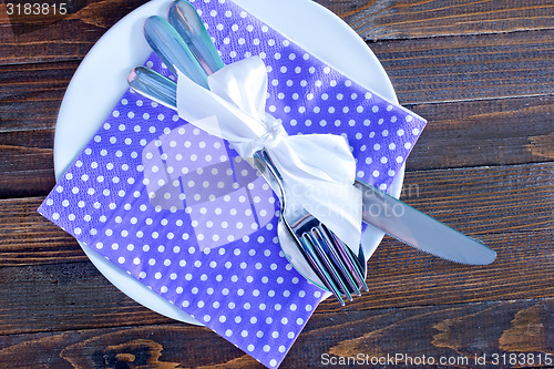 Image of fork, knife and plate