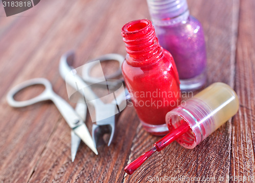 Image of nail and scissors