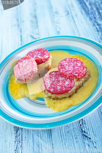 Image of bread with salami and cheese