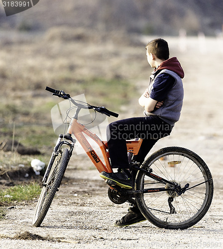 Image of Boy and his bike