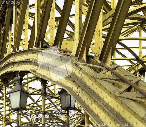 Image of Decorative lamps hanging from bridge