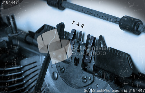 Image of Old typewriter with paper