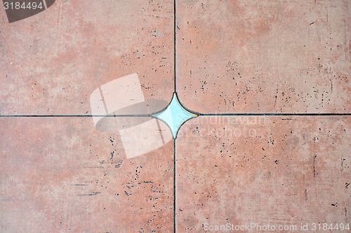 Image of Decorated background tiles terracotta color