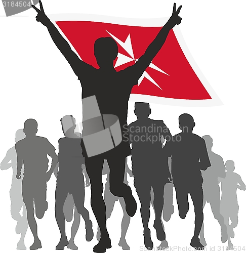 Image of Winner with the Malta flag at the finish