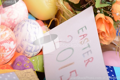 Image of Easter setting with gift box and spring decoration