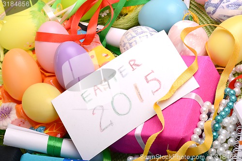 Image of Easter setting with gift box and spring decoration