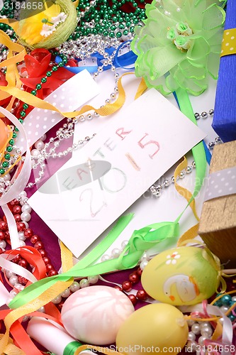 Image of Easter setting with gift box and spring decoration